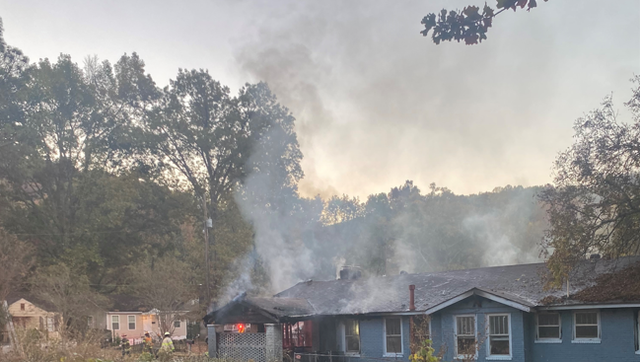 Woman escapes Alabama fire that destroys house