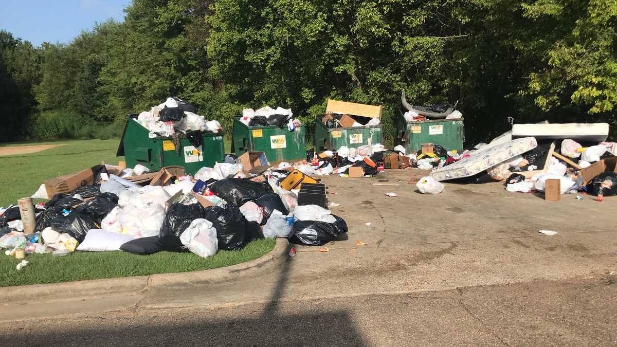 Jackson apartment residents complain about big pile of garbage