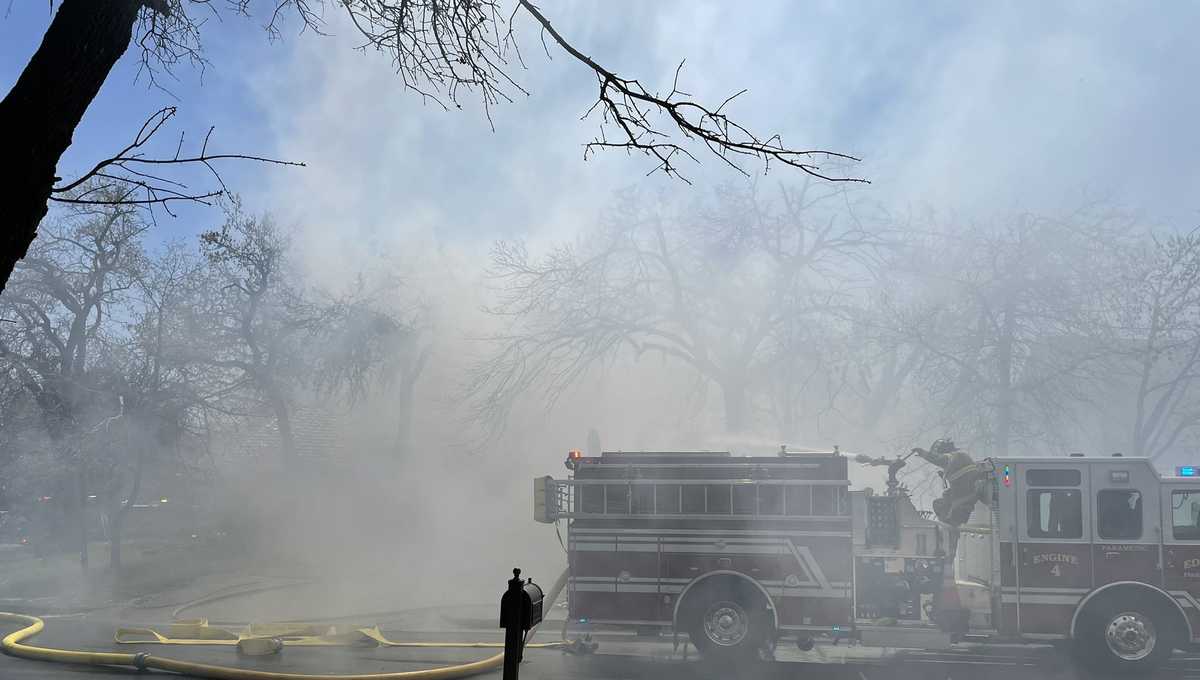 Crews battle house fire in Edmond neighborhood