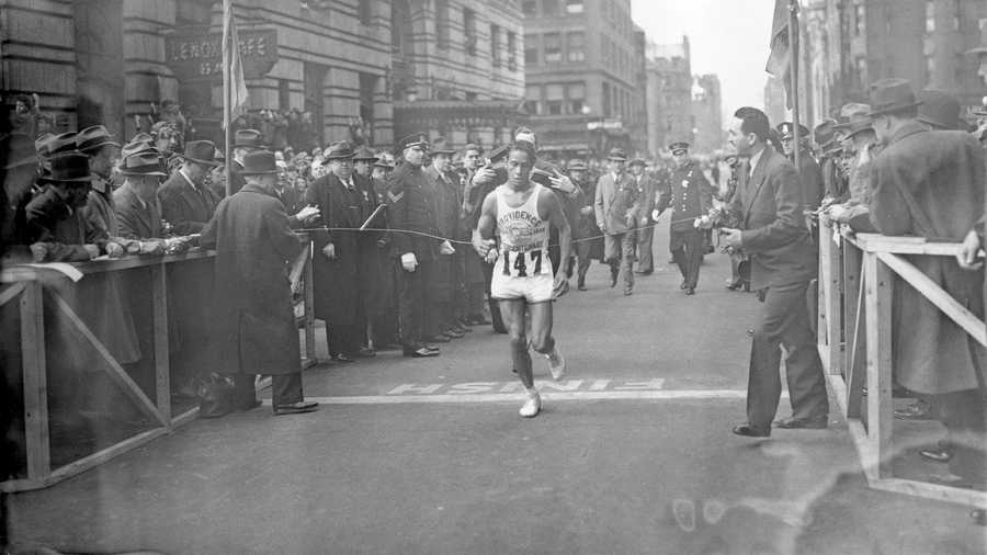 Ellison M. "Tarzan" Brown, a 22-year-old a member of Rhode Island's Narragansett tribe, breaks the tape to win the 40th annual Boston Marathon, in Boston, in this April 19, 1936, file photo. Organizers of the Boston Marathon are seeking to make amends for running the 125th edition on Indigenous Peoples Day by throwing the spotlight on Brown, who won the race twice in the 1930s and inspired the name "Heartbreak Hill." The Boston Athletic Association said Monday, Sept. 27, 2021, it will honor Brown's legacy at the pandemic-altered Oct. 11 running of the race. (AP Photo)