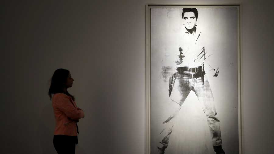 A painting by Andy Warhol called 'Double Elvis [Ferus Type]' (1963) is displayed at Christie's auction rooms in London, Thursday, April 5, 2018. The painting will be offered in the Post-War and Contemporary Art Evening Auction in New York on May 17, and carries a price tag around $30 million.