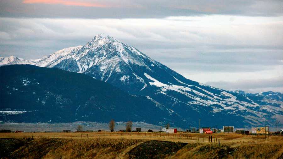 In this file photo, Emigrant Peak towers over the Paradise Valley in Montana north of Yellowstone National Park, on Nov. 21, 2016. Park County authorities said Friday, March 25, 2022, that a hiker was killed in the area in a suspected encounter with a grizzly bear.