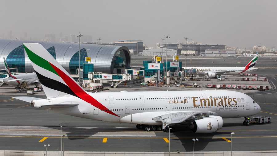 An Airbus SE A380-800 aircraft, operated by Emirates, taxis past the terminal at Dubai International Airport in Dubai, United Arab Emirates, on Monday, March 23, 2020.