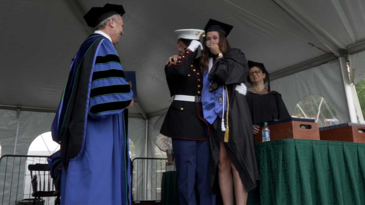 Endicott graduate surprised by Marine brother as she receives diploma(02)