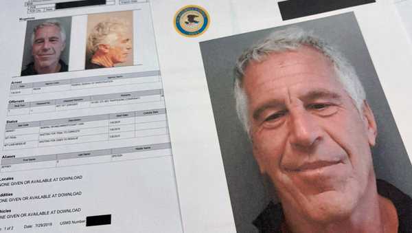 FILE - Documents that were included in the U.S. Department of Justice release of the Jeffrey Epstein files are photographed Friday, Jan. 2, 2026.