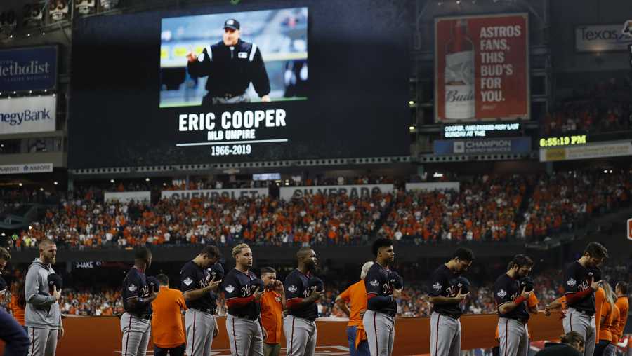 MLB umpire, Iowa native Eric Cooper honored before Game 1 of World Series