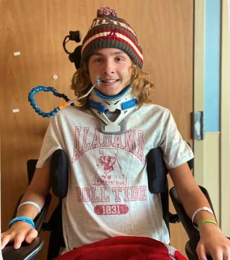 Minnesota's biggest Bama fan back to class after being paralyzed