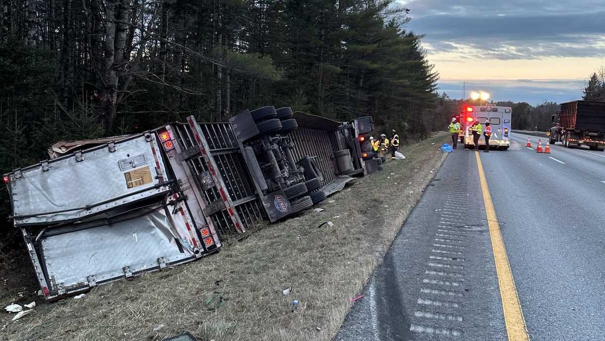 Man pinned for more than an hour after tractor trailer overturns on I-95