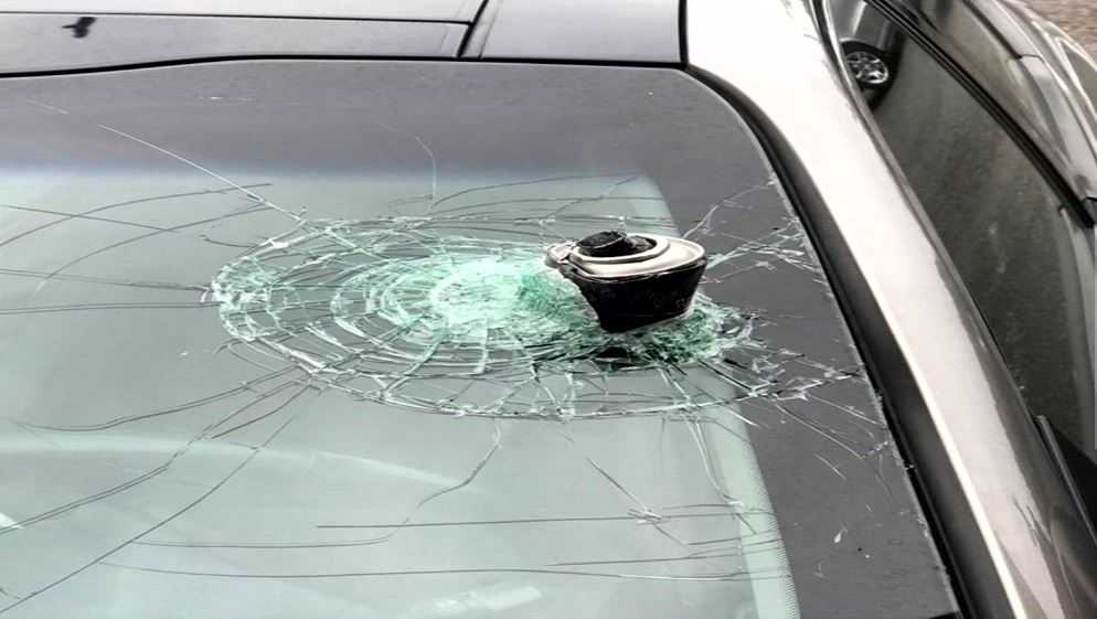 Car Glass Exploding Exploding can of hairspray shatters woman's windshield