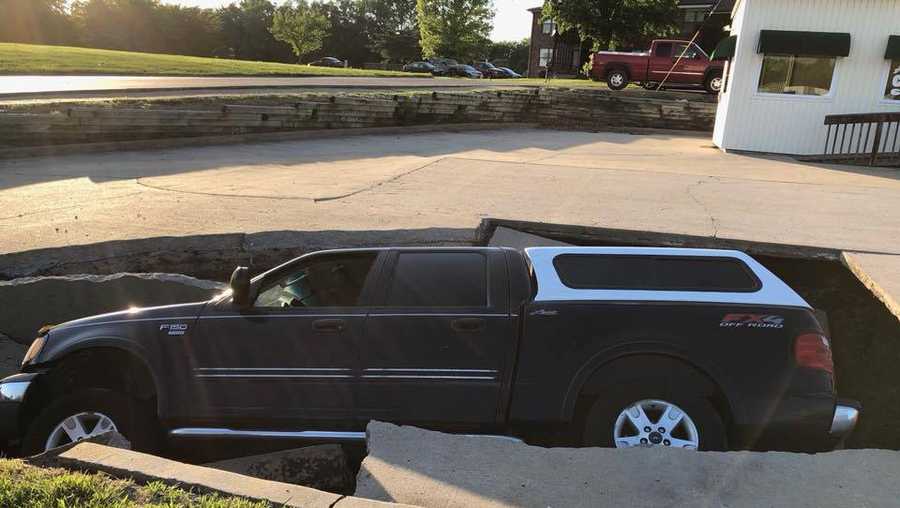 Massive Sinkhole Swallows Truck In Excelsior Springs