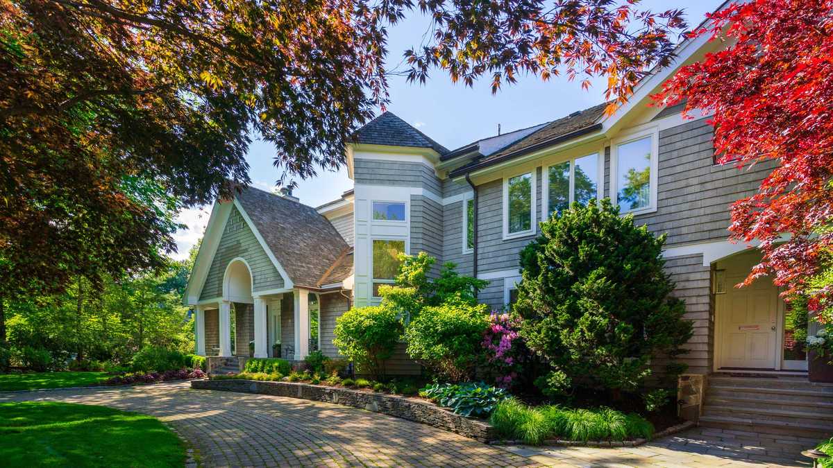 Custom contemporary home on coveted Brookline street market for 4.2M
