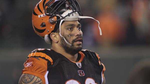 In this Jan. 1, 2012, file photo, Cincinnati Bengals defensive end Jonathan Fanene walks off the field after an NFL football game against the Baltimore Ravens in Cincinnati.