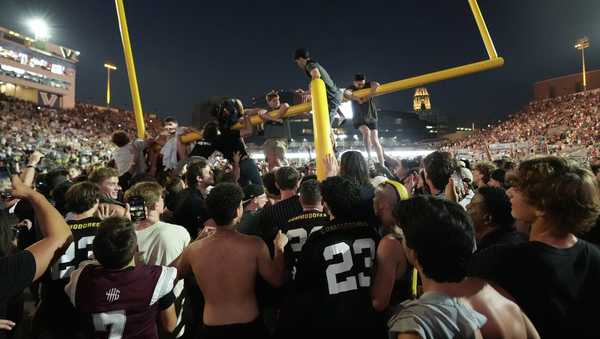 Vanderbilt fans tear down the goal post the after team's 40-35 win over No. 1 Alabama in an NCAA college football game Saturday, Oct. 5, 2024, in Nashville, Tenn.