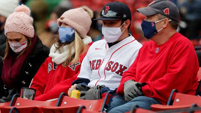 Red Sox fans do the Wally Wave at Fenway 