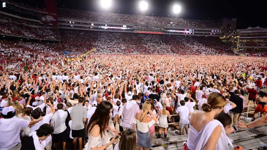 fans storming the field after the texas game