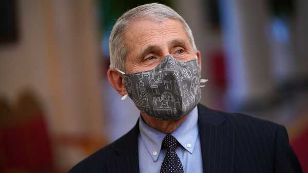 Dr. Anthony Fauci arrives for U.S. President Joe Biden address about the COVID-19 response before signing executive orders in the State Dining Room of the White House in Washington, DC, on January 21, 2021.