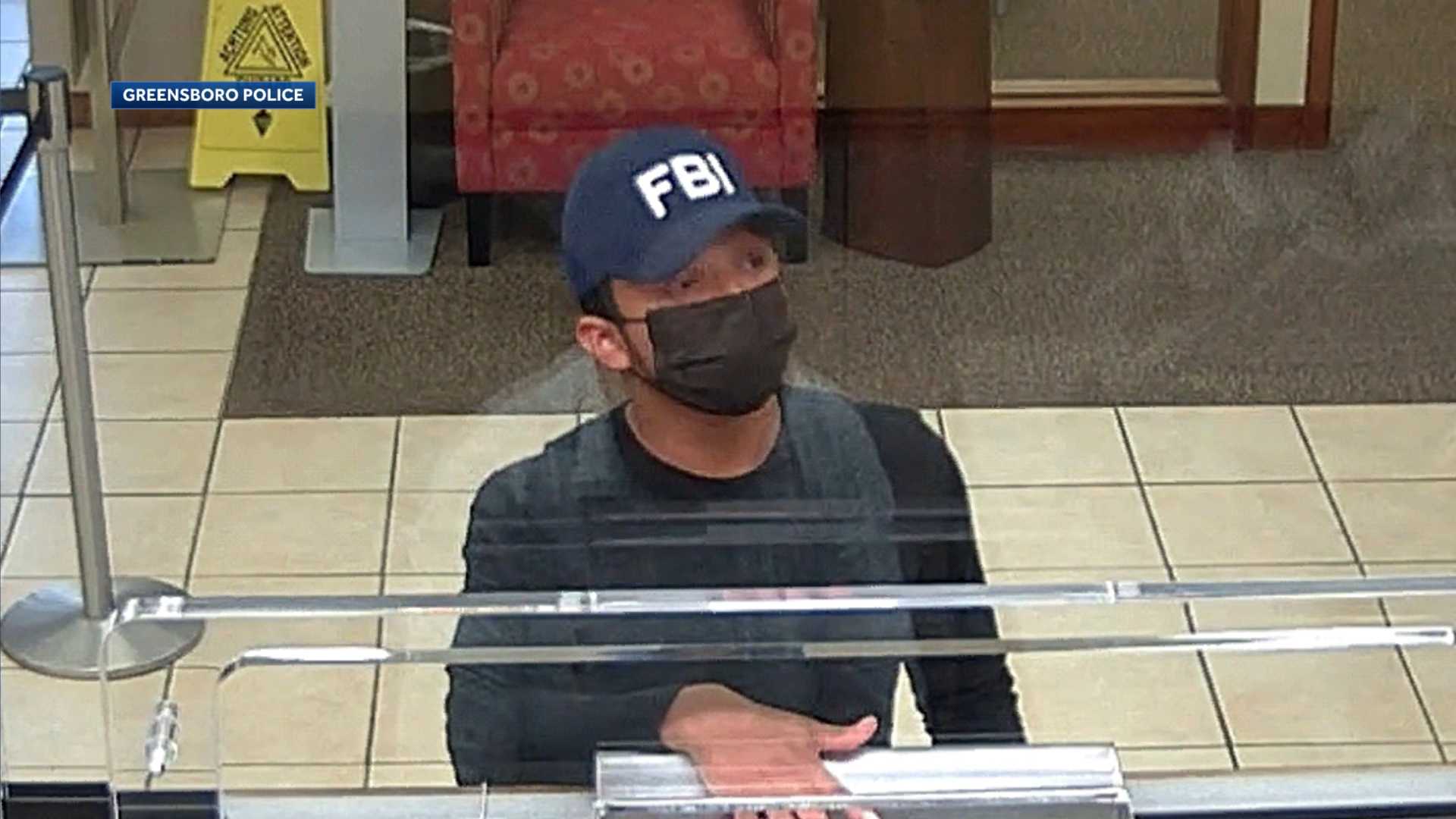 Greensboro bank robber at large, wanted by police