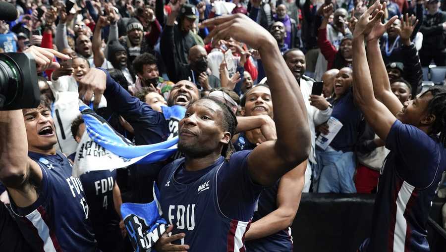 FDU basketball Fairleigh Dickinson players celebrate beating Purdue 63-58 after a first-round college basketball game in the NCAA Tournament Friday, March 17, 2023, in Columbus, Ohio.