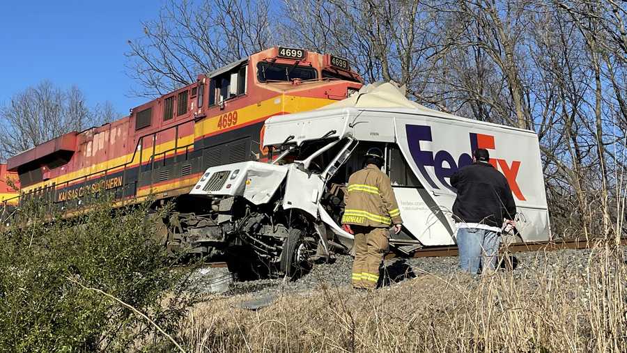 fed ex delivery truck was struck by a train in poteau on wednesday