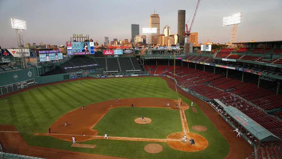 The Boston Red Sox play against the Tampa Bay Rays during the eighth inning of a baseball game at Fenway Park, Thursday, Aug. 13, 2020, in Boston.