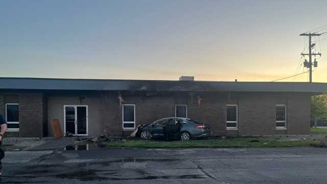 1 hospitalized after car crashes into building and catches fire in ...