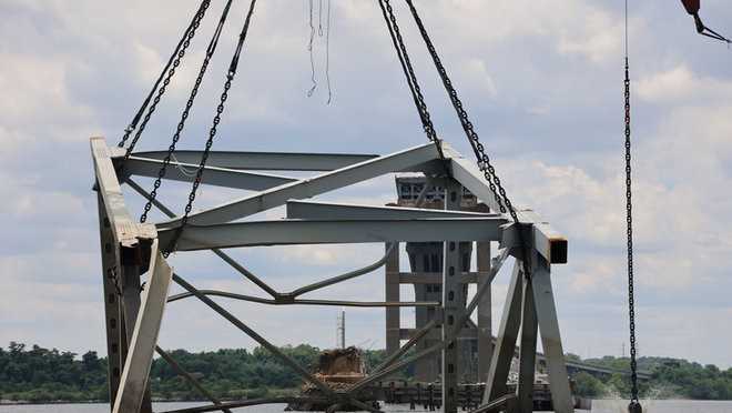 Crews remove last large steel truss bridge segment from channel - Vimarsana News