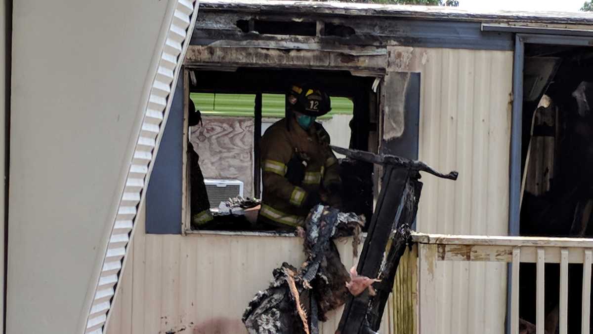 Mobile home destroyed after fire starts on kitchen stove, 1 person ...