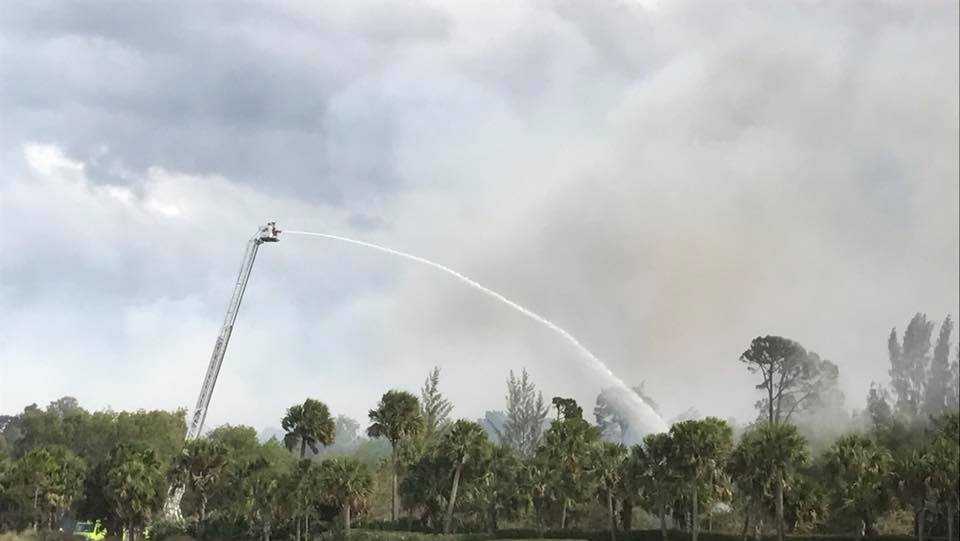 Photos: Crews battle Palm Beach Gardens brush fire