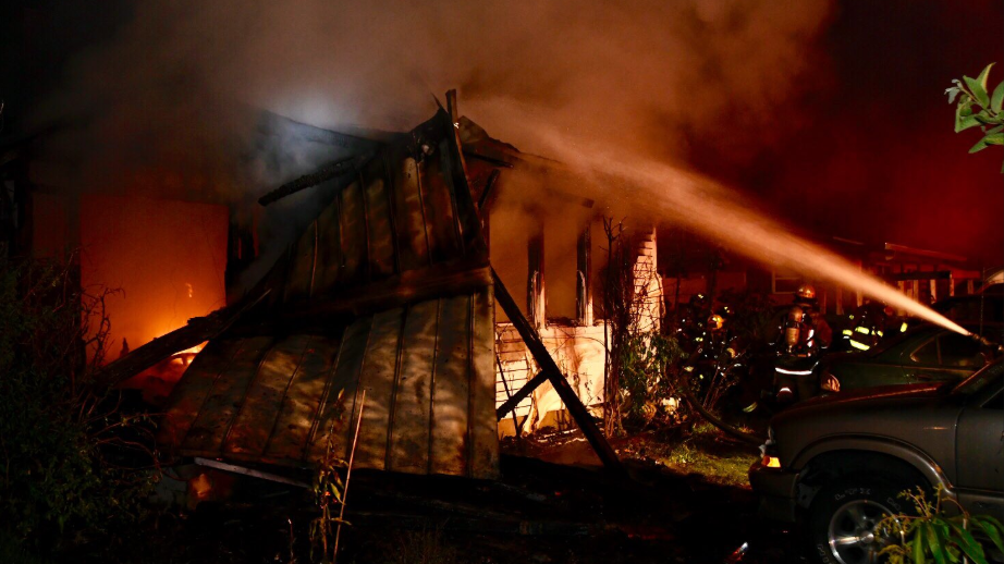 Person hospitalized after fire rips through Orange County home ...