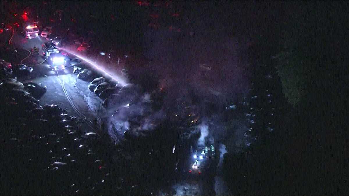 Fire engulfs vehicles at Taunton auto auction car lot