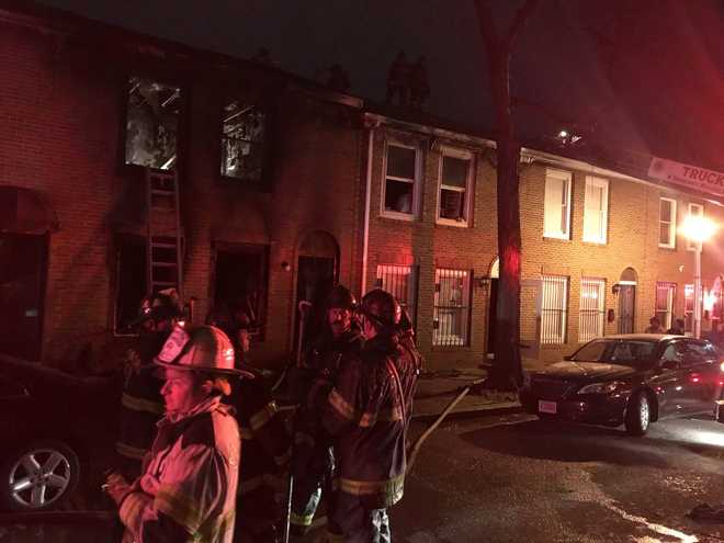 Firefighters battle 2-alarm fire in west Baltimore