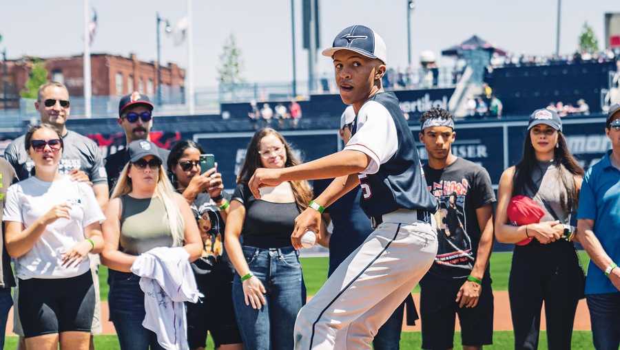 jovan familia throws out first pitch at polar park in worcester.