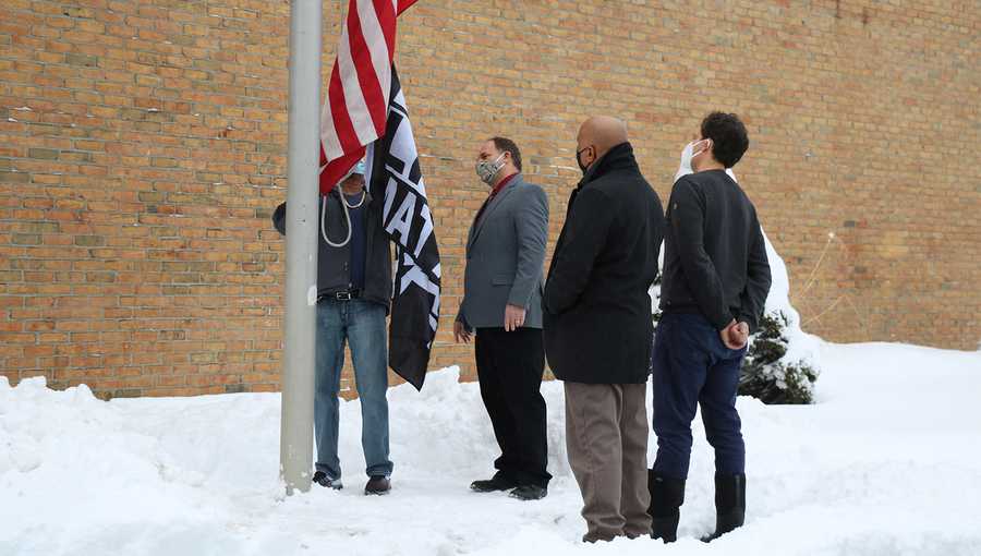 A Black Lives Matter flag is raised at a South Burlington middle school on Feb. 3, 2021.