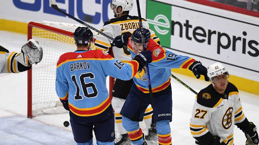 Florida Panthers' Aleksander Barkov (16) celebrates scoring a goal with Matthew Tkachuk during the second period of an NHL hockey game against the Boston Bruins, Wednesday, Nov. 23, 2022, in Sunrise, Fla.