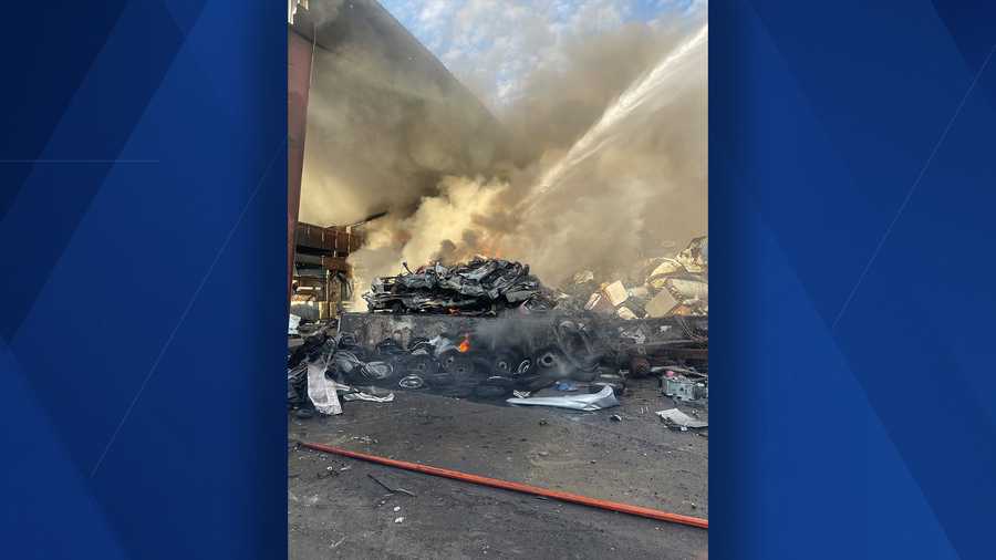 scrapyard catches fire in fort myers
