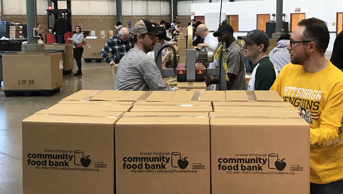 Greater Pittsburgh Community Food Bank holding food ...