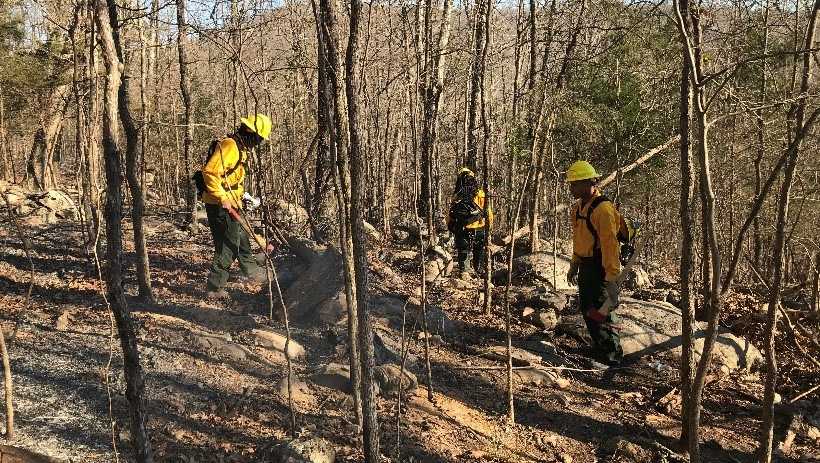 alabama a&m university students helped the alabama forestry commission patrol the fire edge for remaining hot spots after a wildfire at keel mountain in northern alabama.