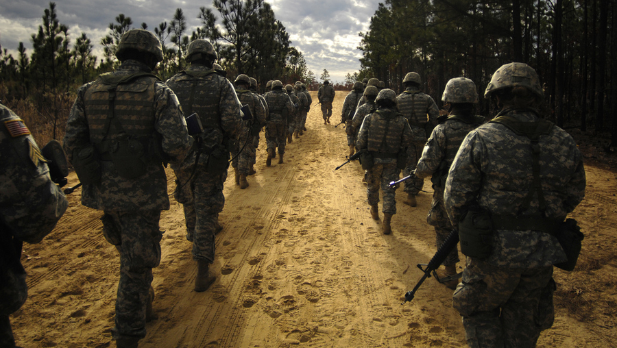 U.S. Army recruits practice patrol tactics while marching during U.S. Army basic training at Fort Jackson, S.C., Dec. 6, 2006. 
