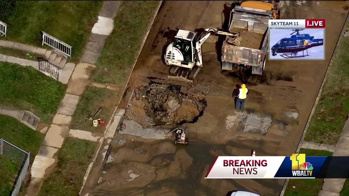 Large sinkhole forms after water main breaks in Essex
