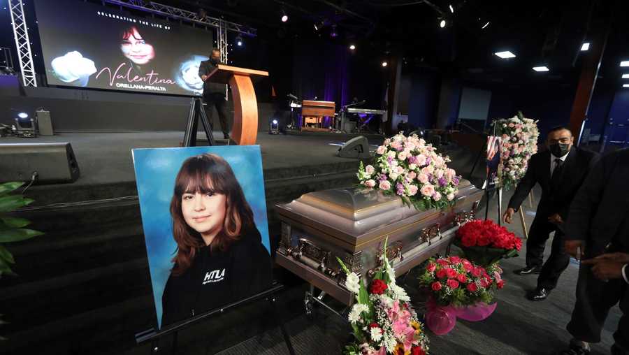 The casket containing 14-year-old Valentina Orellana-Peralta, killed on Dec. 23, 2021 by a LAPD police officer's stray bullet while shopping with her mother, is readied for her funeral at the City of Refuge Church in Gardena, Calif., Monday, Jan. 10, 2022.