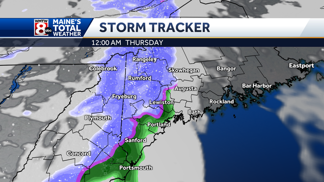 Snow showers and squalls cross the area tonight