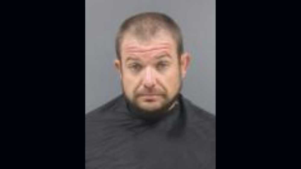 Man arrested after police find machine guns, silencer and drugs
