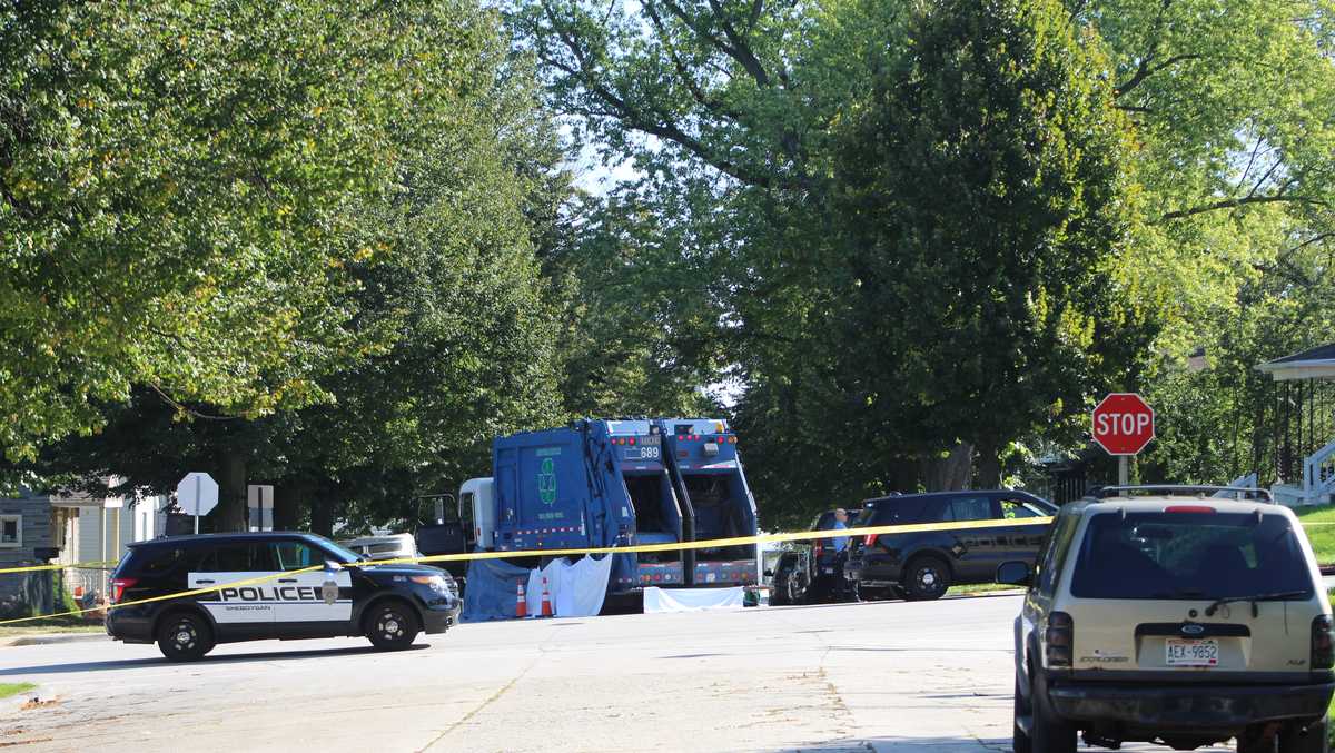 Child on bike dies after being hit by city garbage truck