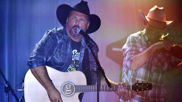 Garth Brooks performs at Joe's in Chicago, Monday, July 15, 2019, on the first stop of his Dive Bar tour. Garth has partnered with Seagram's 7 Crown to secure 700,000 pledges to #JoinThePact, a pledge to never drive impaired. (Photo by Rob Grabowski/Invision/AP)