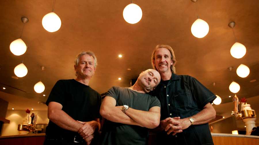 Members of Genesis (left to right) Tony Banks, Phil Collins, and Mike Rutherford will perform in Toronto tomorrow night at BMO field. Here they pose at Air Canada Centre after a sit-down interview with the Star's Greg Quill. 