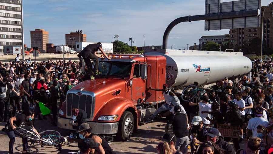 A tanker truck drives into thousands of people on 35W northbound highway during a protests over the death of George Floyd on Sunday, May 31, 2020, in Minneapolis. Protests in the wake of the death of George Floyd while in police custody have erupted across the country. (Salwan Georges/The Washington Post via Getty.)