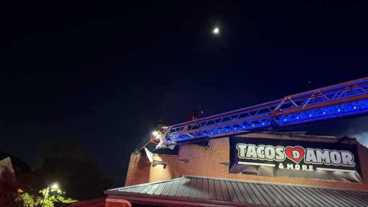 Firefighters work to put out restaurant fire in northwest Louisville