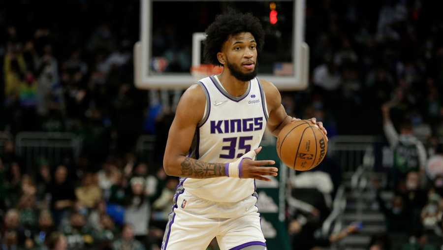 Marvin Bagley III #35 of the Sacramento Kings dribbles the basketball up court during the second half of the game against the Milwaukee Bucks at Fiserv Forum on January 22, 2022 in Milwaukee, Wisconsin. Bucks defeated the Kings 133-127. NOTE TO USER: User expressly acknowledges and agrees that, by downloading and or using this photograph, User is consenting to the terms and conditions of the Getty Images License Agreement. (Photo by John Fisher/Getty Images)