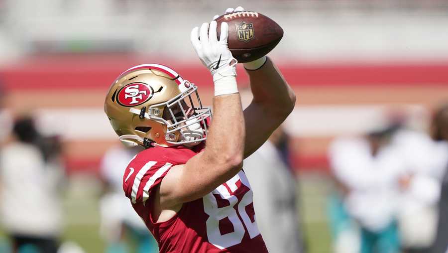 San Francisco 49ers tight end Ross Dwelley warms up before the