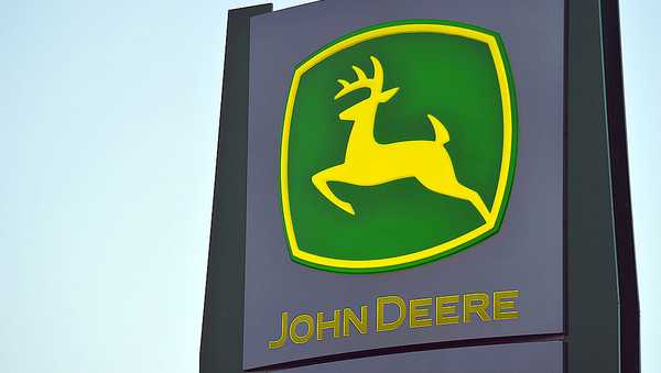 The John Deere company logo is seen on a sign in Velva, North Dakota on September 28, 2010.  AFP PHOTO/Karen BLEIER (Photo credit should read KAREN BLEIER/AFP via Getty Images)